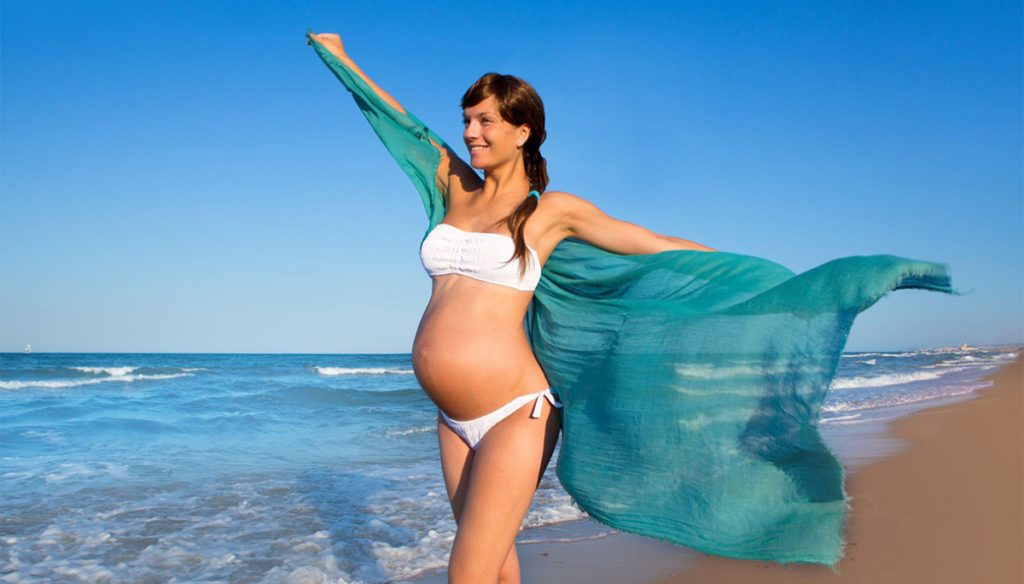 On the beach with a big belly: the tips to be beautiful