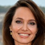 Angelina Jolie turns the page after Brad and sees ex-husband Jonny Lee Miller again