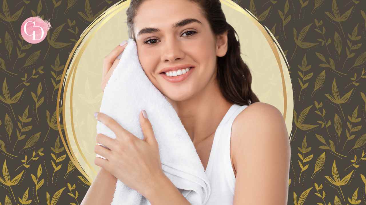 wipe face with towel