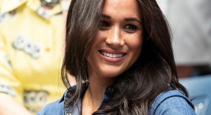 What is that mysterious blue patch on Meghan Markle's wrist?
