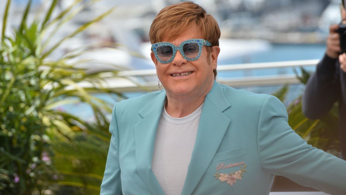 Why was singer Elton John hospitalized in France?