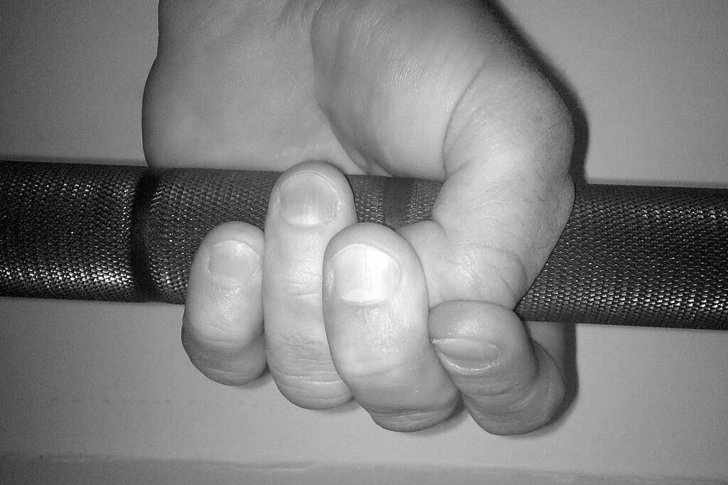 Before using a lock grip, be sure to stretch your hands and warm up your knuckles.
