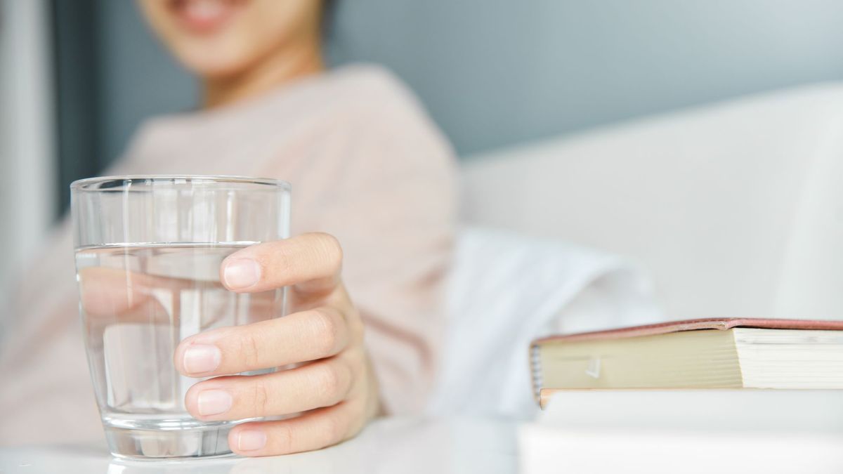 Why should you never leave a glass of water next to your bed?