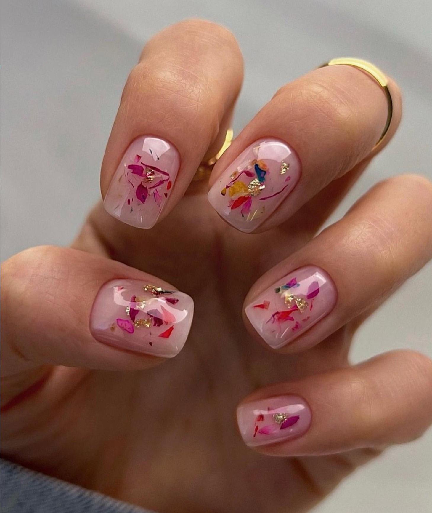 Transparent nails with decor look like a work of art