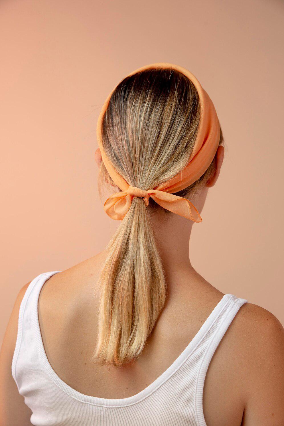 Try using a scarf instead of your usual hair accessories.